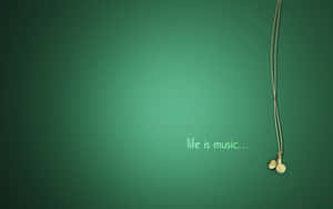 米色耳機懸掛在綠色漸變背景上，帶有「life is music...」文字。