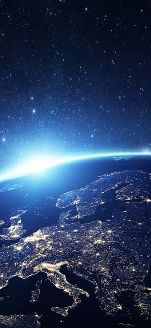 從太空夜間看到的地球，城市發光，星星閃爍