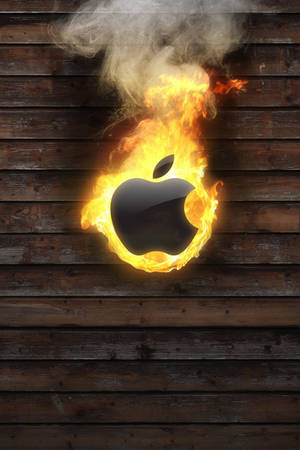 深色木牆上燃燒中的Apple標誌，煙霧升騰。