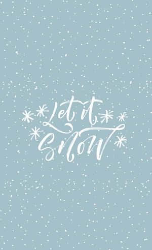藍色背景上帶有雪花和 Let it Snow 文字