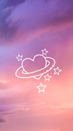 在粉紫色天空中的心形行星，帶有光環和星星。 — 可愛情人節gif 壁紙