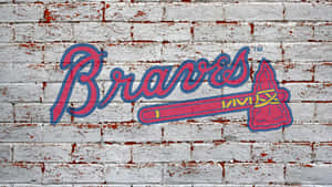 Braves棒球標誌塗在生鏽的磚牆上。
