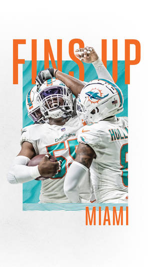邁阿密海豚隊美式足球員以 'FINS UP' 文字慶祝達陣。