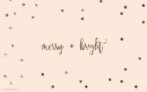 桃色背景上的金色星星和merry bright文字