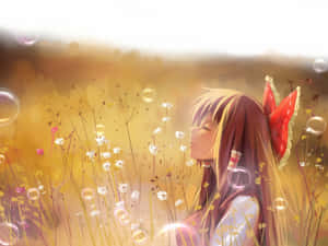 金色花田中漂浮氣泡的戴紅色蝴蝶結動漫女孩。