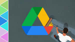 用掃帚在灰色地板上清掃彩色Google Drive標誌的人。 — 插畫 壁紙
