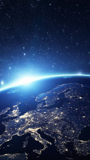 夜晚的地球，閃爍的城市燈光和星空 — 太空 壁紙