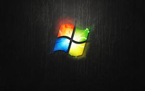 在深色皮革紋理上發光的Windows標誌 — 視窗 壁紙