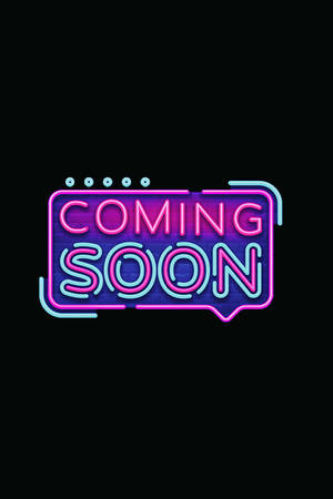霓虹燈招牌在黑色背景上以粉紅和青色寫著「COMING SOON」