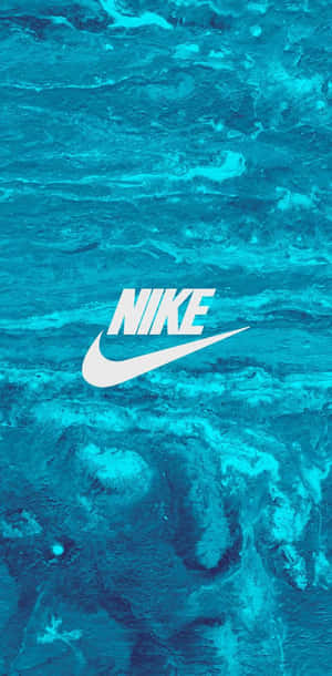 Nike標誌在旋轉的藍色水背景上。 — 型格 Nike 壁紙
