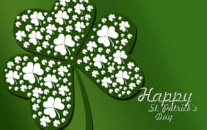 Happy St. Patrick's Day 問候，帶有大型四葉草設計。