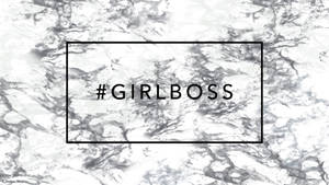 大理石背景上黑色盒子內的 girlboss hashtag