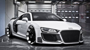帶有黑色飾件的白色奧迪R8跑車停放在工業車庫中。 — Audi R8 GIF 壁紙