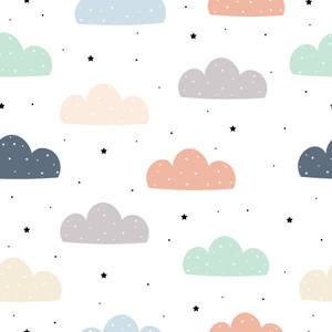 白色背景上帶有白色圓點和黑色星星的粉彩色雲朵。