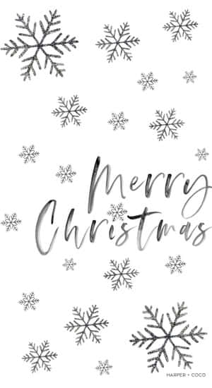 白色背景上銀色字體Merry Christmas，周圍環繞雪花。