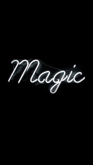 發光白色霓虹燈牌在黑色背景上寫著Magic