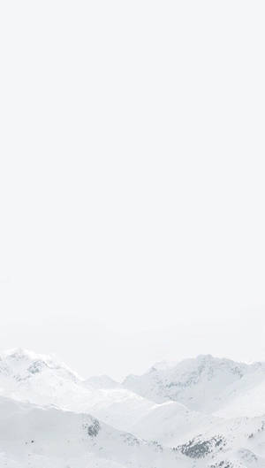 朦朧白色天空下的白雪覆蓋山脈 — 白色美學gif 壁紙