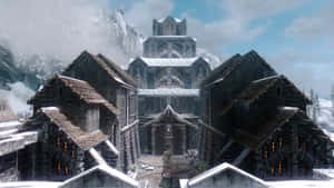 白雪覆蓋的石建築和山村中的大教堂。 — 天空美學 壁紙