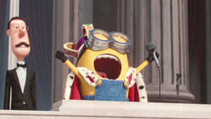 一個卡通Minion着住皇室服裝喺舞台上對住咪高峰大叫。