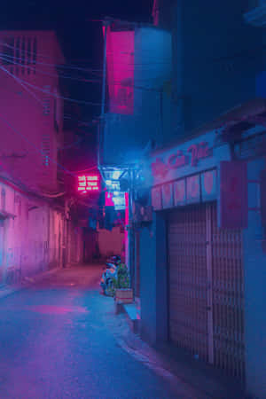 夜晚霓虹燈照亮的小巷，商店關門，潮濕的路面反射出五彩燈光。 — 美學手機GIF 壁紙