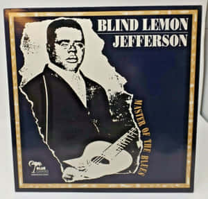 專輯封面展示 Blind Lemon Jefferson 揸住結他，有金色邊框同文字。