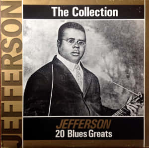 Jefferson 20 Blues Greats 的專輯封面，展示一位身穿西裝的男子手持結他。