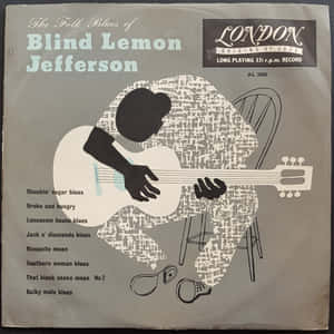 Blind Lemon Jefferson 的民謠藍調唱片專輯封面，特色是坐著的吉他手剪影。