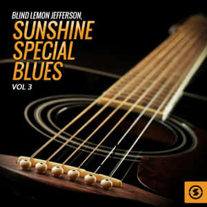 原聲結他帶有 Blind Lemon Jefferson 的 Sunshine Special Blues Vol 3 專輯標題文字。