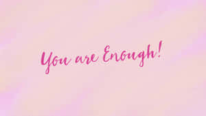 粉紅色水彩背景，帶有激勵性草書文字 'You are Enough!'