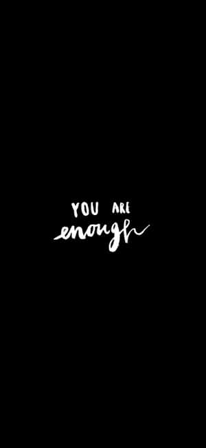 黑色背景上的白色勵志語句 you are enough — Pixel 10 Pro 壁紙