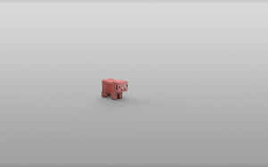 灰色背景上來自Minecraft的方塊狀粉紅豬。