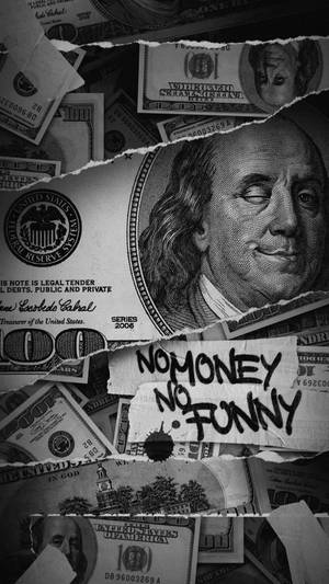 撕裂的美元鈔票，在本傑明·富蘭克林的肖像上有塗鴉寫著「No Money No Funny」。