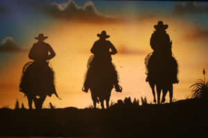 三個騎馬的牛仔剪影，背景是日落沙漠天空，有鳥兒飛翔。