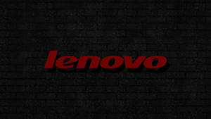 紅色Lenovo標誌在黑色磚牆上帶有陰影效果。