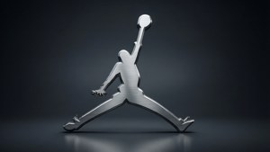 閃亮銀色Jordan標誌雕塑，描繪籃球運動員灌籃。 — Jordan 標誌 GIF 壁紙