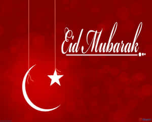 Eid Mubarak 問候，新月和星星懸掛在紅色散景背景上。 — 5:4 壁紙