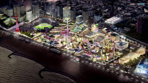夜間遊樂場，沿著城市海濱有明亮的遊樂設施。 — 紐約市 壁紙
