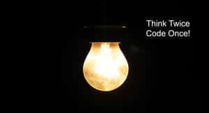 一個亮著的燈泡，上面有短語 Think Twice Code Once，背景為黑色。
