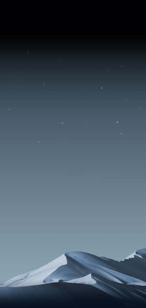 積雪的山峰在繁星點點的夜空下，帶有漸變的藍色調。 — Galaxy Note 壁紙