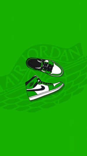 綠色和白色的Air Jordan運動鞋漂浮在帶有模糊品牌的綠色背景上。