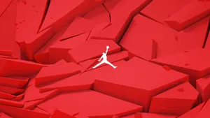 白色Jordan標誌跳過紅色破碎方塊的3D設計。
