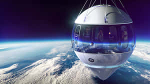 太空艙載著乘客從軌道觀看地球 — 太空 壁紙