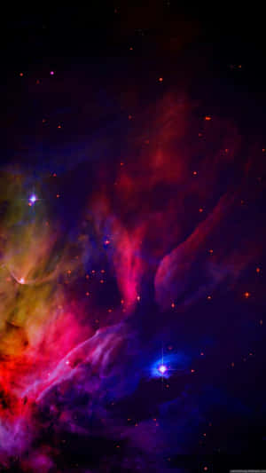在深空中帶有發光星體的充滿活力的宇宙星雲。