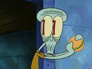 Squidward 拎住一個食咗一半嘅漢堡，震驚嘅樣。 — 海綿寶寶 meme GIF 壁紙
