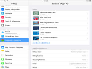 iPad 設定畫面，顯示 Passbook 和 Apple Pay，並列出信用卡和扣賬卡。