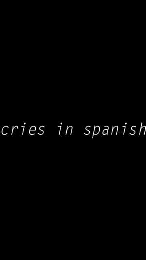 黑色背景，白色文字顯示 cries in spanish