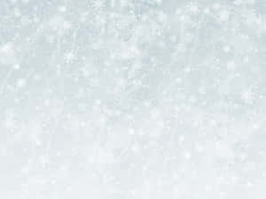 雪花飄落在霜藍色紋理冬日背景上。