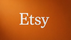 橙色背景上的白色文字 Etsy 標誌