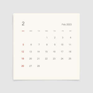 2023年2月日曆，星期日以紅色顯示在奶油色背景上。