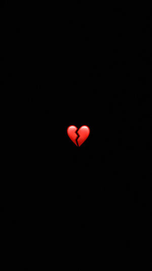 一個紅色破碎心形表情符號居中於黑色背景上。 — 心碎 GIF 壁紙